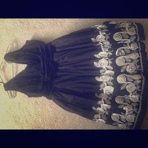 Black frilly dress with white flowers